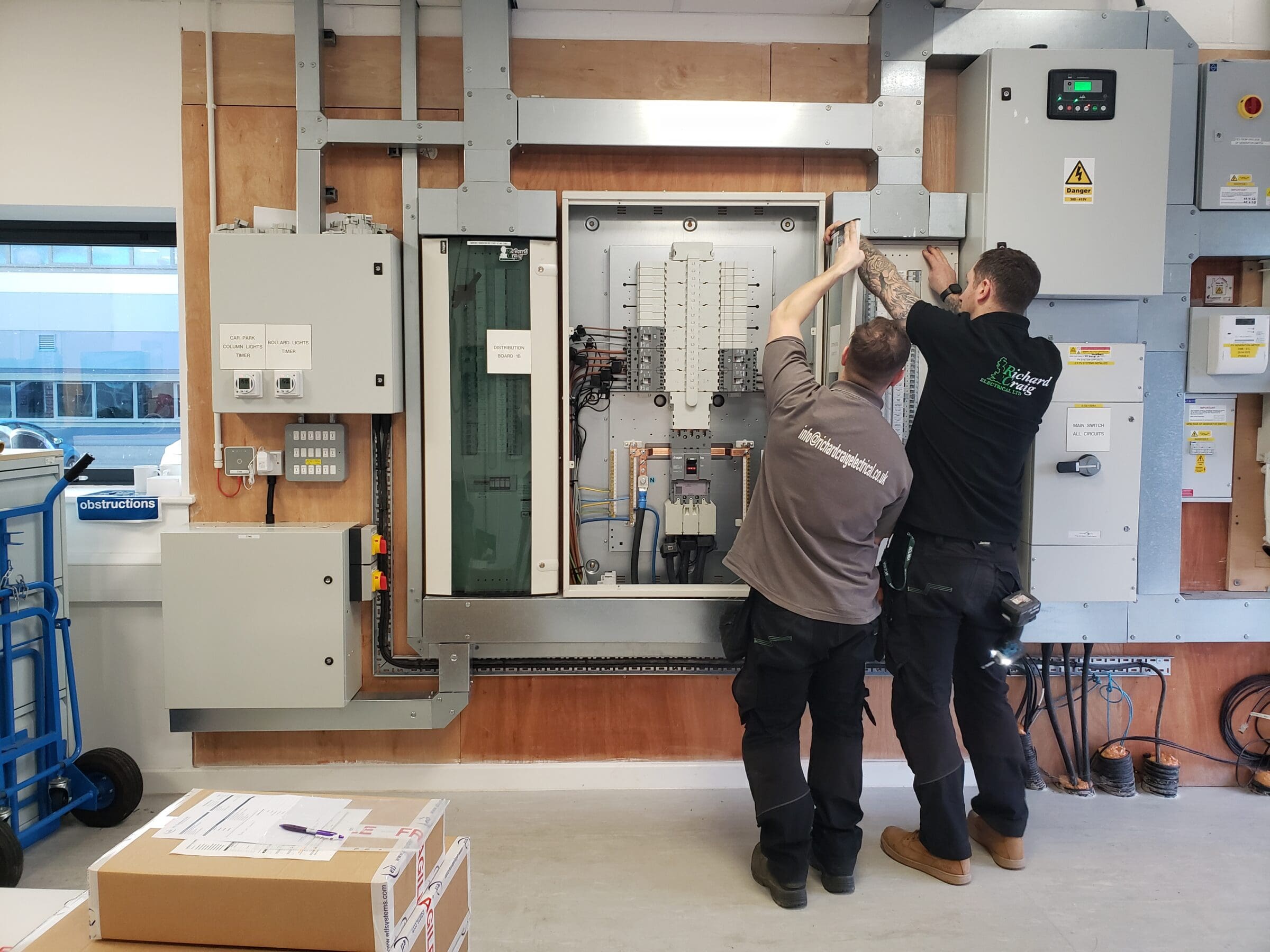 People working on large fuse board3